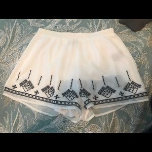 Printed white romper shorts